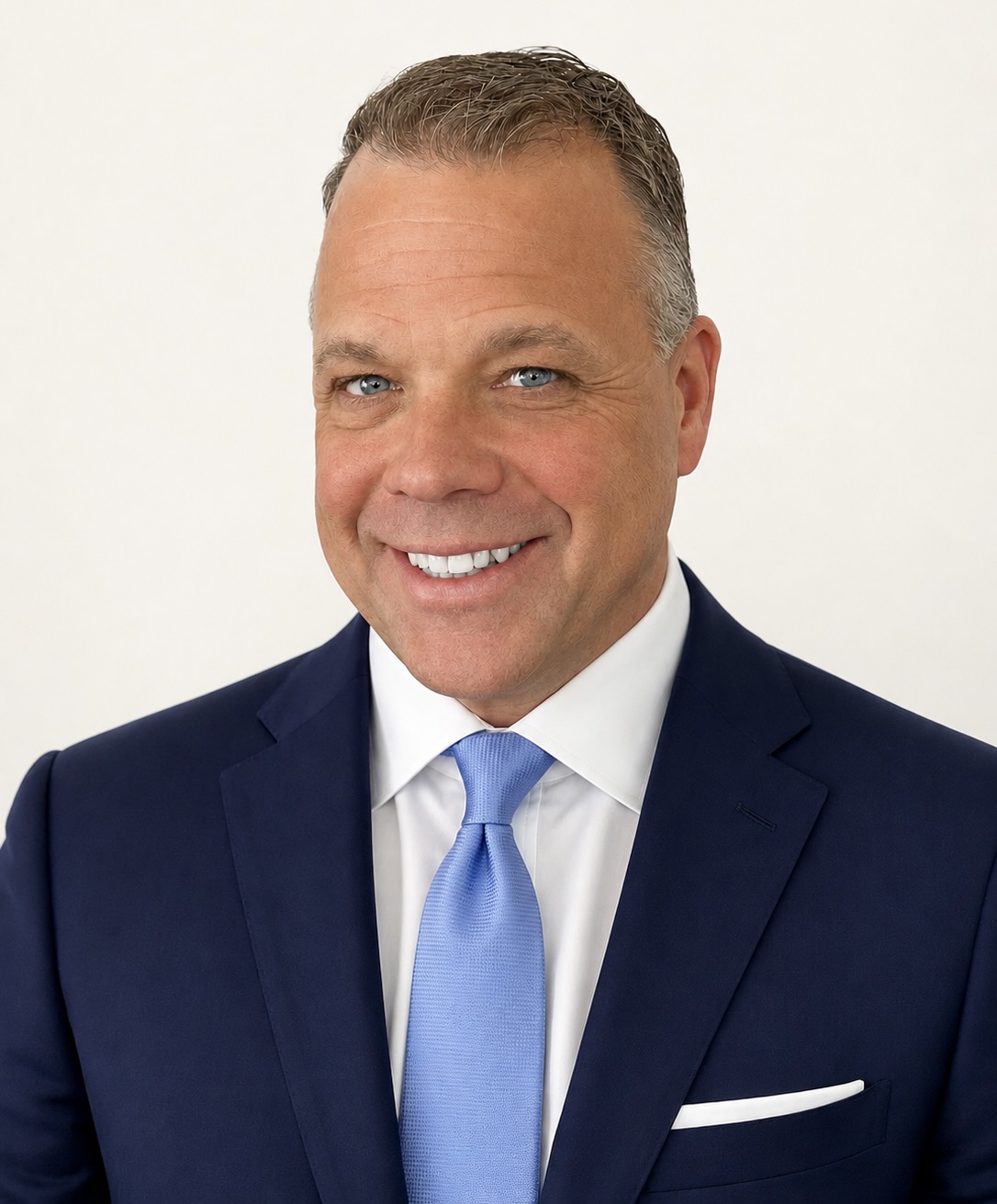 Portrait of Chris Birdsall, CRO of Universal Network Services